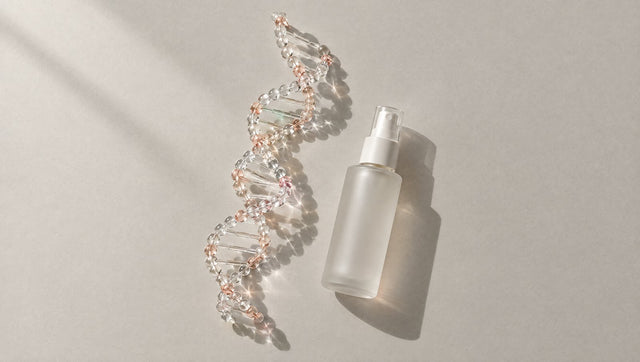 Glass-bead double helix beside a frosted spray bottle