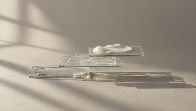 Three glass slides stacked like stairs with liquid, gel and cream