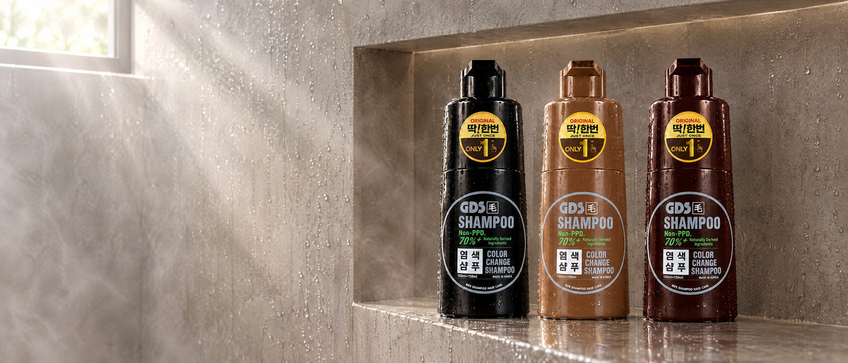 GDS Hair Dye Shampoo in Black, Brown and Dark Brown — renewed Non-PPD two-part bottles on a shower shelf