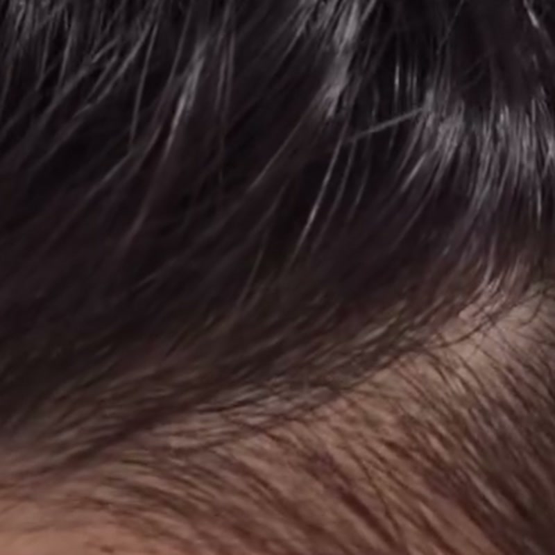 The same parting after use, the grey strands blended in